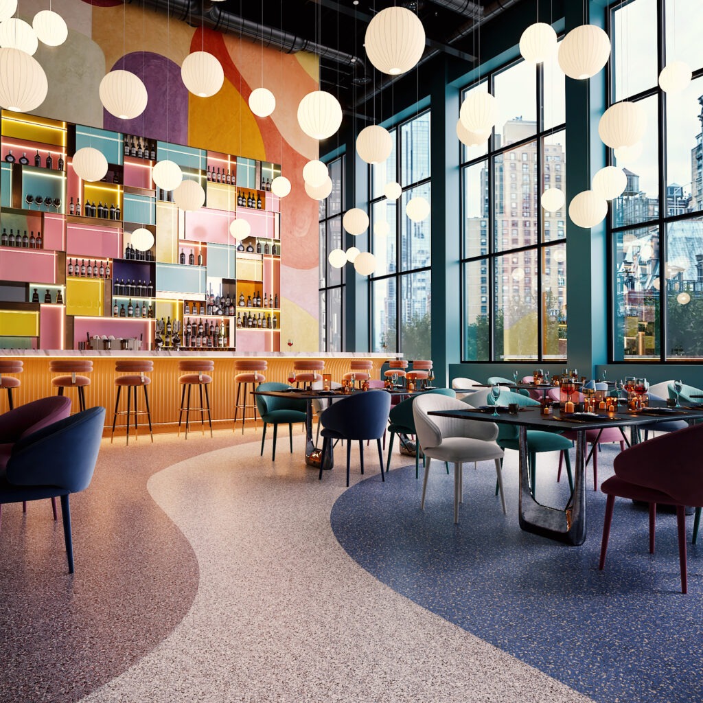 Bright and stylish bar area featuring colorful decor, a well-stocked shelf of bottles, and modern seating. Large windows showcase a city view.